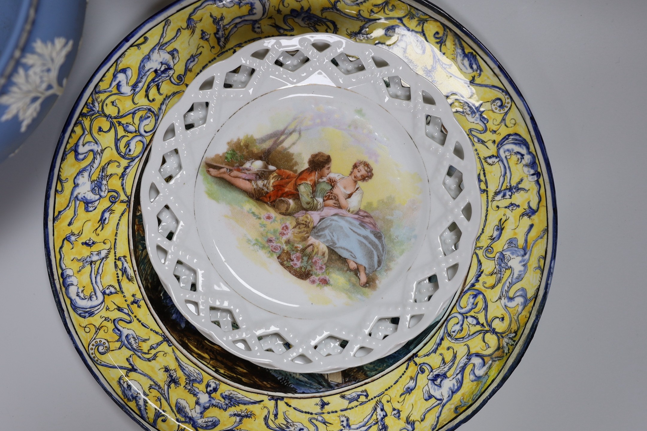 A Gien faience dish, Wedgwood jasper fruit bowl, an Art Deco Katzhutte figure and a pair of basketweave dishes, tallest 23cm